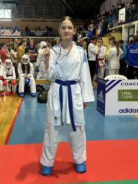 Teja Pecman ponosna z doseženim tretjim mestom v borbah